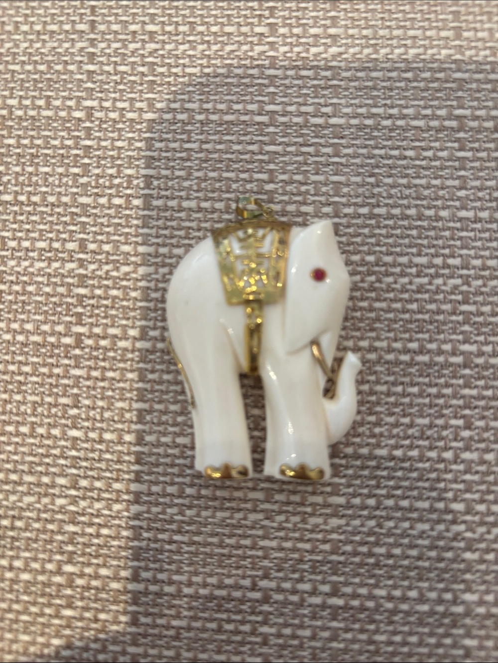 Vintage ivory and 14 karat gold elephant